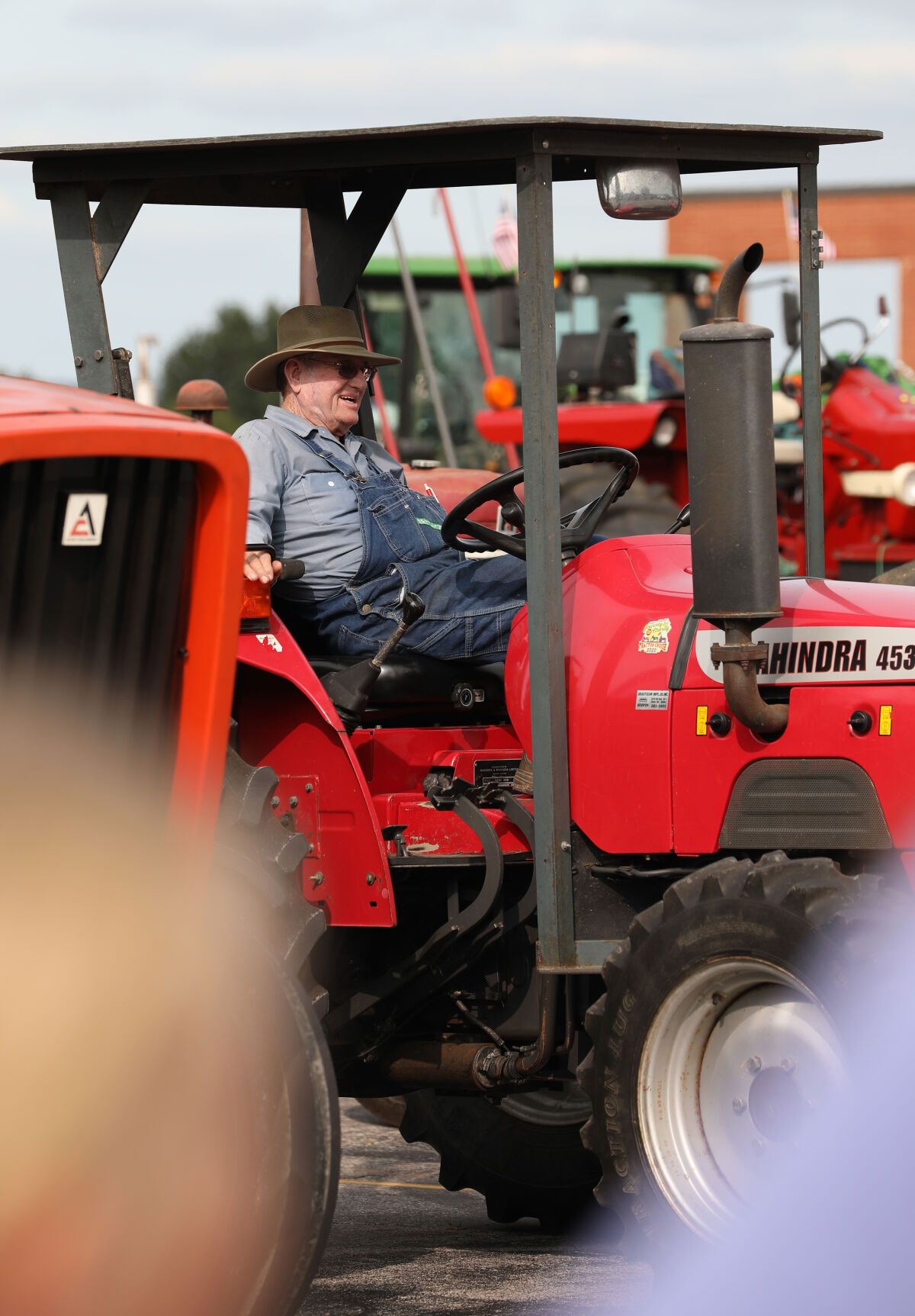 Jimmy Mueller sits in his tractor